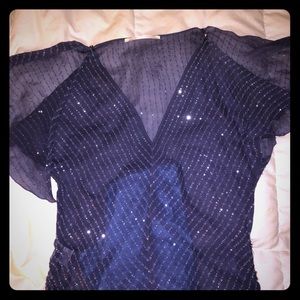 Evening top with split sleeves.